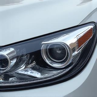 A crystal clear and transparent headlight lens after professional restoration.